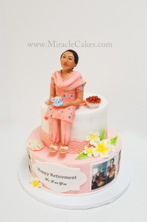 Retirement cake with a handcrafted figurine. Having Chai tea and Indian sweets